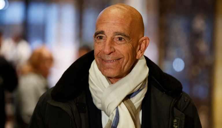 In this 2017 photo, Tom Barrack speaks with reporters in the lobby of Trump Tower in New York before meeting with President-elect Donald Trump.