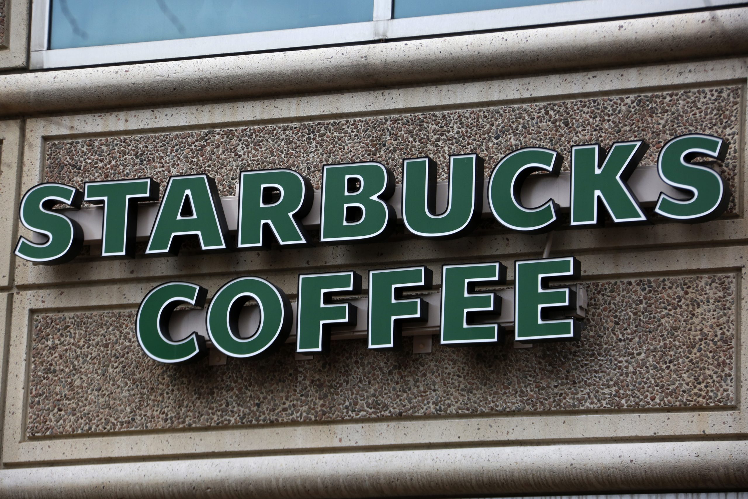 Starbucks apologizes after video showing arrest of two African-American men at store goes viral