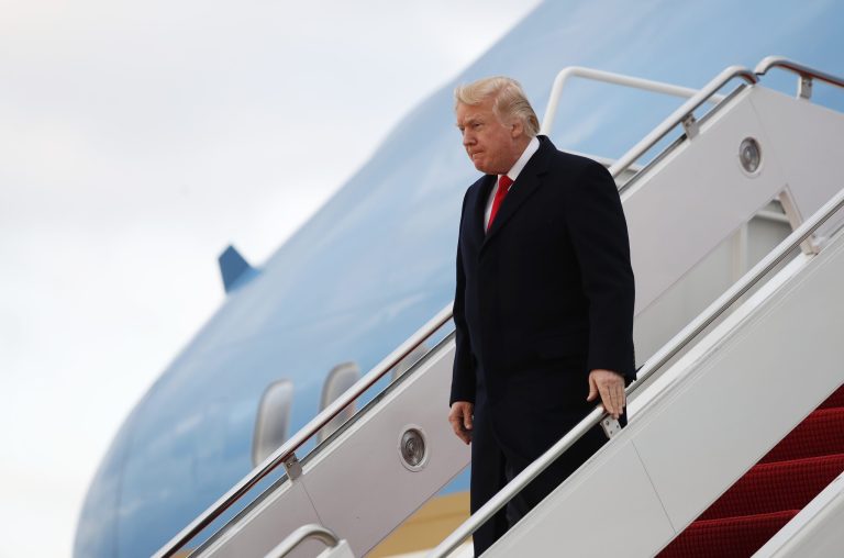 President Donald Trump disembarks Air Force One upon arrival at Andrews Air Force Base, Md., Sunday, March 19, 2017, from a trip to Florida.