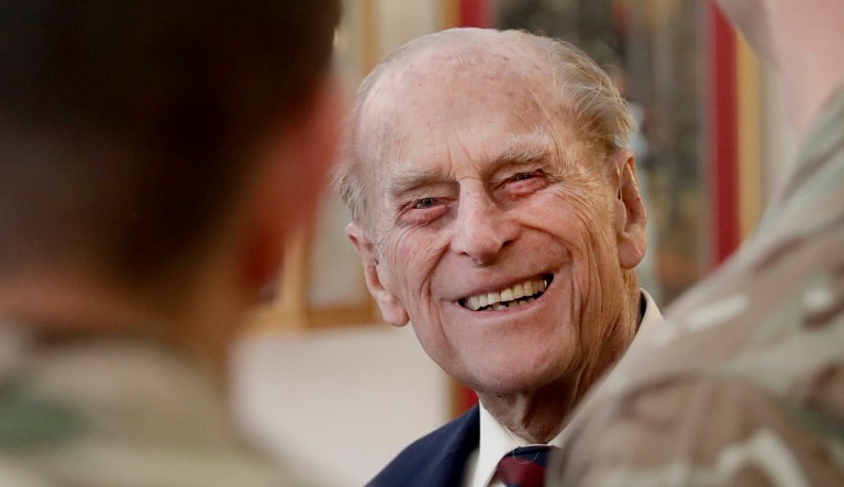 Britain's Prince Philip chats to sergeants from 1st Battalion Grenadier Guards in their Mess at Lille Barracks in Aldershot, England.