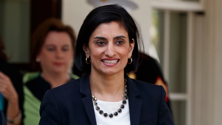 Seema Verma, administrator of the Centers for Medicare and Medicaid Services, walks to speak with reporters outside the White House.