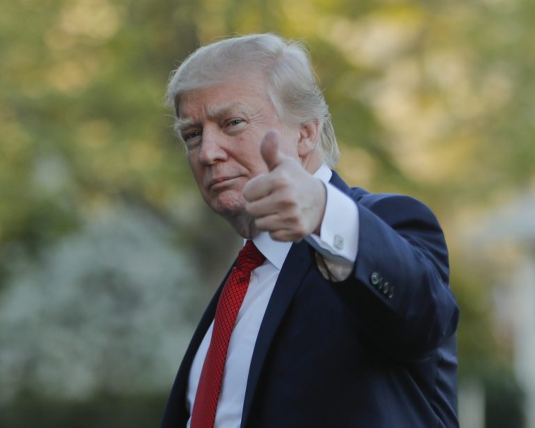 In this April 9, 2017, file photo, President Donald Trump gives a thumbs-up as he walks across the South Lawn of the White House in Washington, as he returns from a trip to his Mar-a-Lago estate in Palm Beach, Fla. 