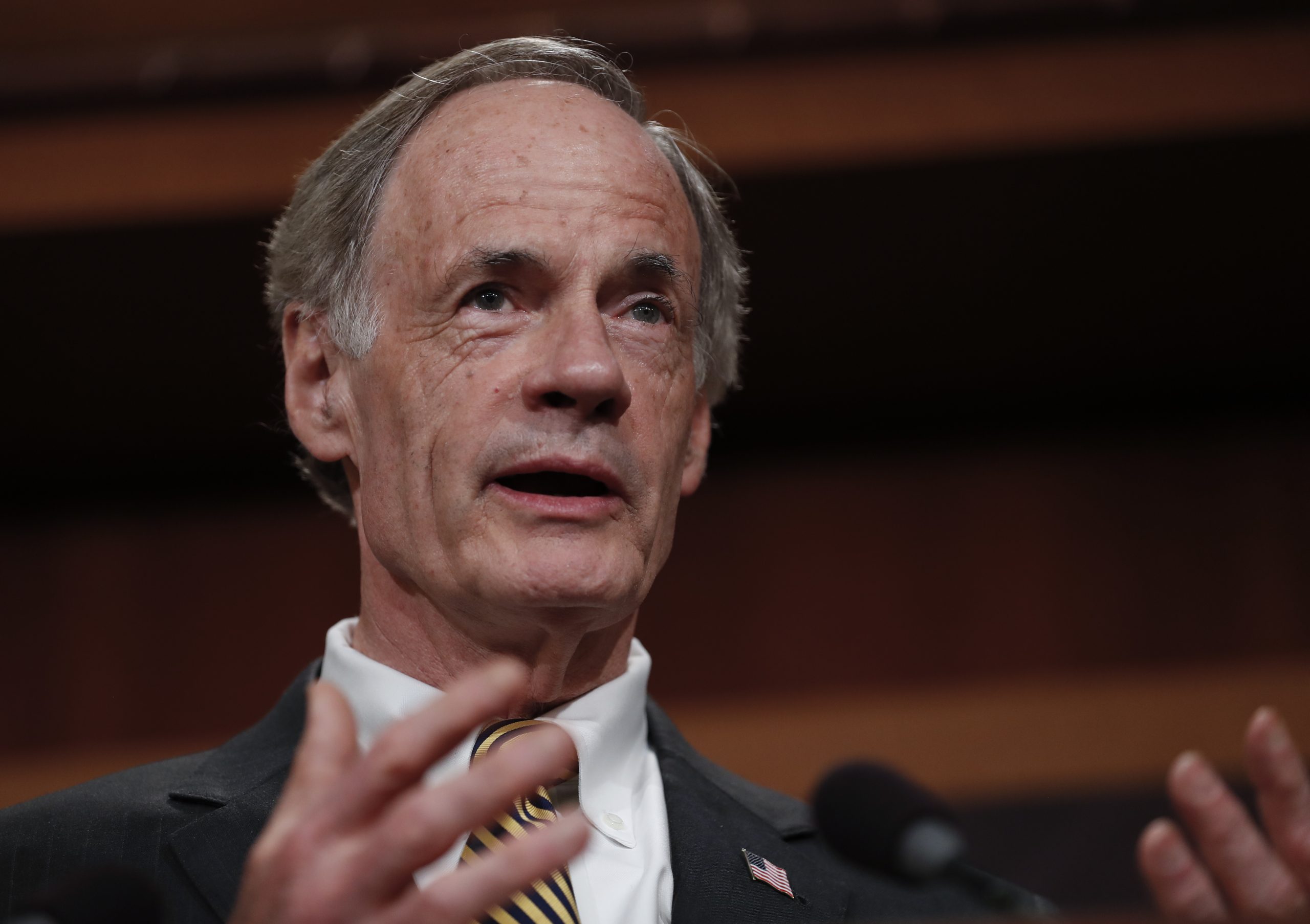 Sen. Tom Carper of Delaware speaks during a news conference.
