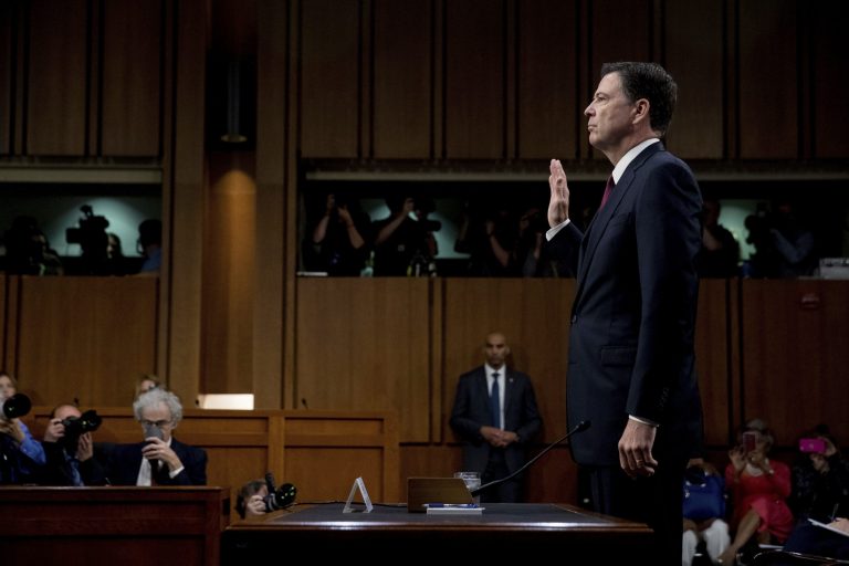 Former FBI director James Comey is sworn in during a Senate Intelligence Committee hearing on Capitol Hill, Thursday, June 8, 2017, in Washington.