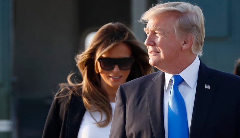 President Donald Trump and first lady Melania Trump walk from Marine One to board Air Force One, Wednesday, July 12, 2017, in Andrews Air Force Base, Md., en route to Paris. President Donald Trump and France's Emmanuel Macron may be the world's most unlikely political odd couple. Far apart on climate change and immigration, the two leaders will look for common ground on terrorism and defense policy when they meet in Paris. 