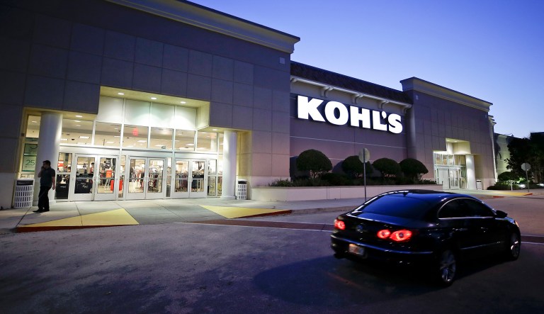 A car drives by the entrance of a Kohl's department store in Orlando, Fla. The retailer and its rivals are monitoring closely a proposal to add 25 percent tariffs on an additional $200 billion in Chinese imports.