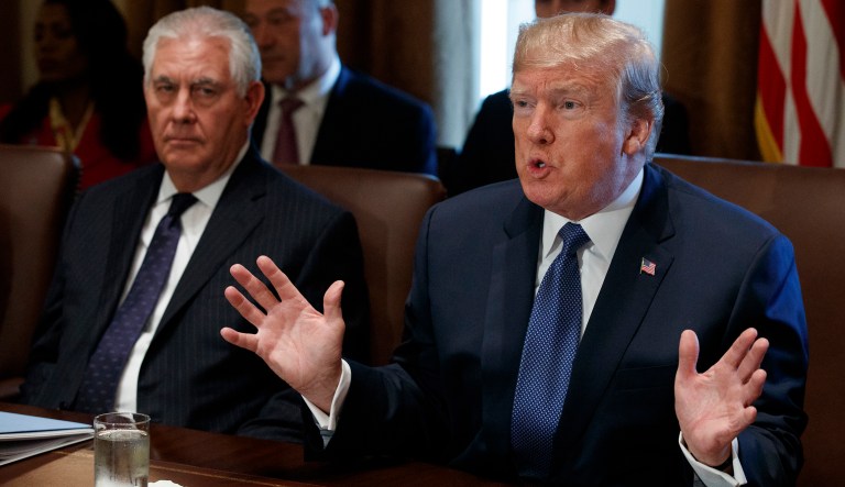 Secretary of State Rex Tillerson listens as President Donald Trump speaks during a cabinet meeting at the White House.