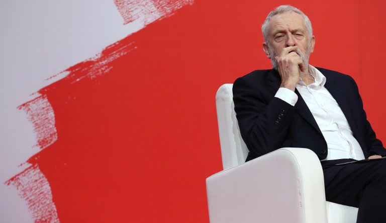 Jeremy Corbyn, leader of Britain's Labour Party, listens to speakers during the Party of European Socialists Council in Lisbon, Dec. 2 2017.