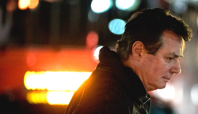 Paul Manafort, President Trump's former campaign chairman, gets into a taxi after arriving at Union Station in Washington.