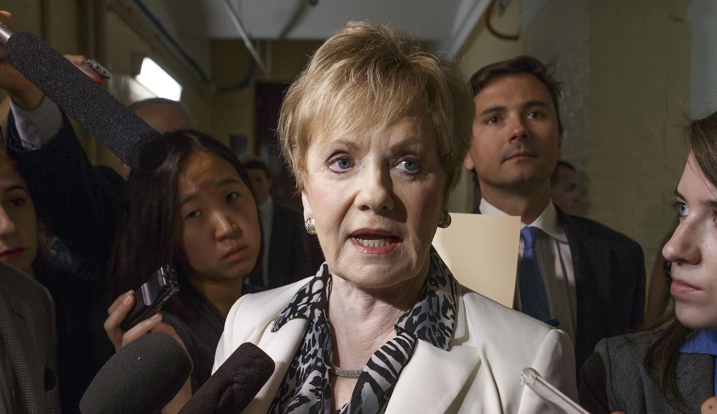 Rep. Kay Granger, R-Texas, is surrounded by reporters on Capitol Hill in Washington.