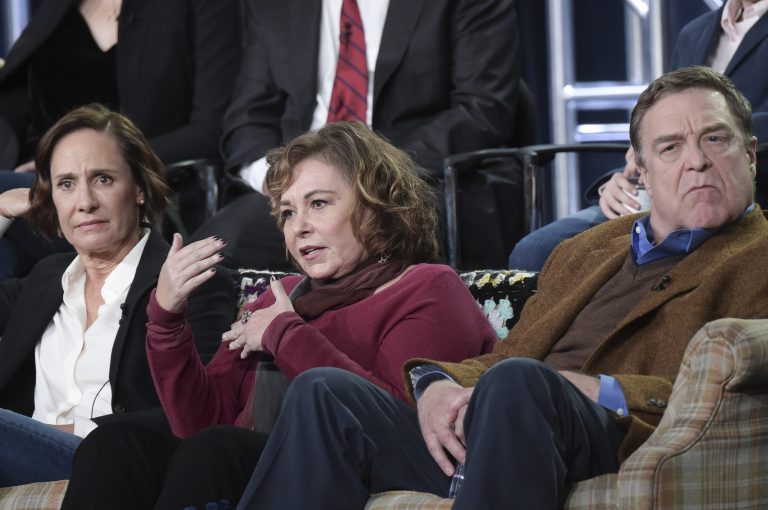 Laurie Metcalf, left, Roseanne Barr and John Goodman participate in the "Roseanne" panel during the Disney/ABC Television Critics Association Winter Press Tour on Monday, Jan. 8, 2018, in Pasadena, Calif.