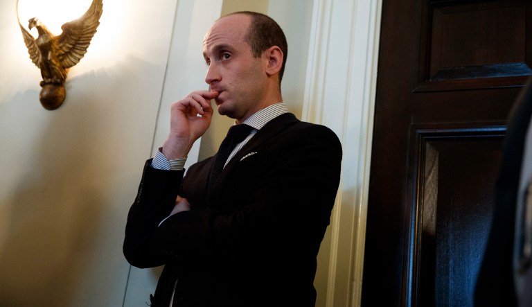 Senior White House adviser Stephen Miller listens as President  Trump speaks during a meeting with lawmakers on immigration policy. 