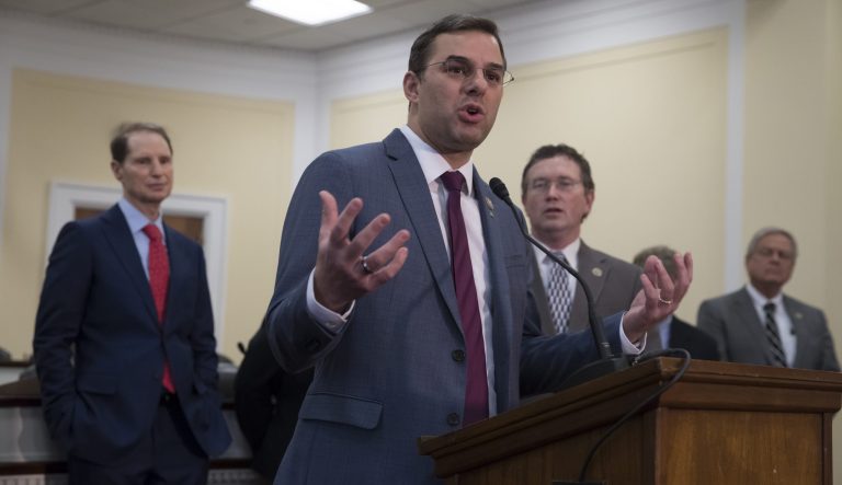 Rep. Justin Amash, R-Mich., as he hosts a news conference demanding the U.S. government should be required to seek warrants if it wants to search for information about Americans at the Capitol in Washington, Wednesday, Jan. 10, 2018. 