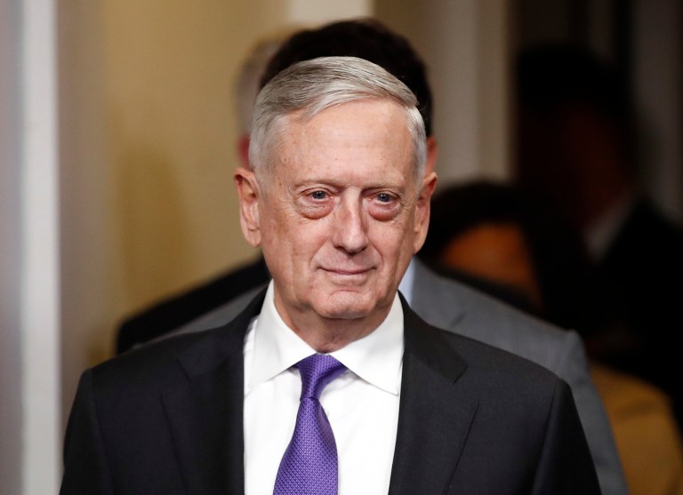 In this Feb. 7, 2018, photo, Defense Secretary Jim Mattis arrives for the daily news briefing at the White House in Washington. The United States is urging allied nations to help deal with the growing number of foreign fighters that are being held by the U.S.-backed Syrian Democratic Forces, saying the militants should be turned over to face justice in their home countries. Mattis is expected to raise the issue during a meeting in Rome this week with other members of the coalition that is fighting the Islamic State group in Iraq and Syria.