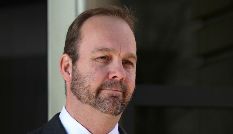 Rick Gates is pictured departing federal court in Washington.