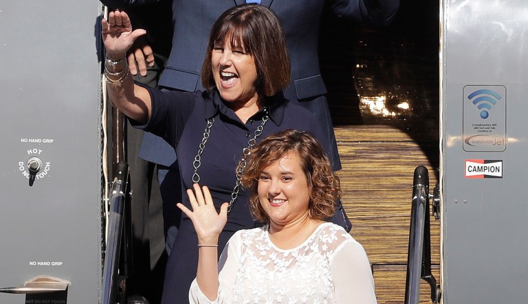 In this July 16, 2016 file photo, Karen Pence, background, and her daughter Charlotte arrive for a welcome home rally in Zionsville, Ind.