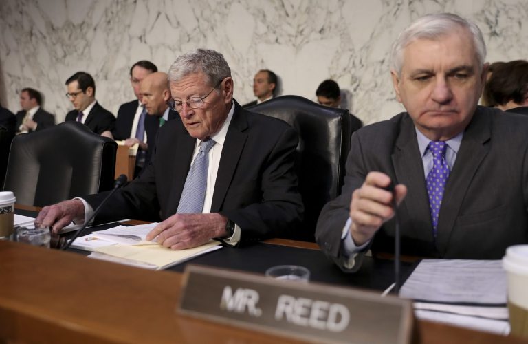 Senate Armed Services Committee member Sen. Jim Inhofe, R-Okla., left, and Ranking Member Sen. Jack Reed, D-R.I., right, sit during a hearing on Capitol Hill in Washington.