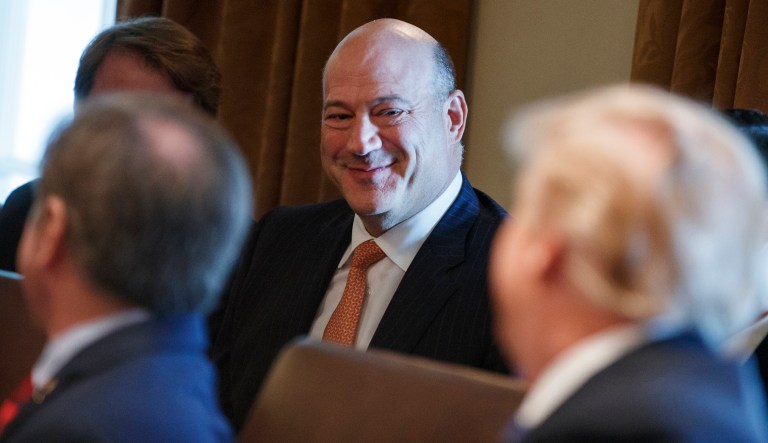 President Trump speaks to outgoing White House chief economic adviser Gary Cohn during a cabinet meeting at the White House. 
