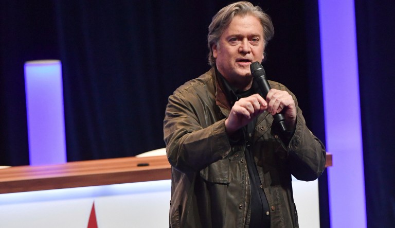 Former White House strategist Steve Bannon addresses members of the far-right National Front party at the party congress in the northern French city of Lille, Saturday, March 10, 2018.