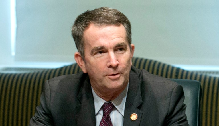 Virginia Gov. Ralph Northam attends a meeting.