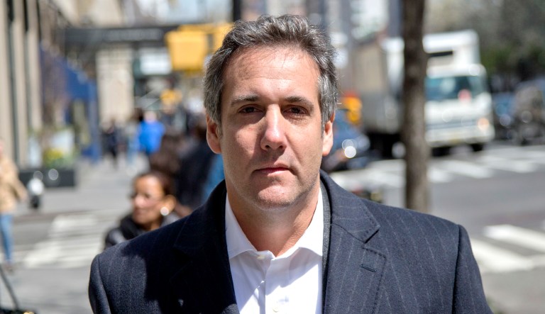 Attorney Michael Cohen walks down the sidewalk in New York, Wednesday, April 11, 2018.