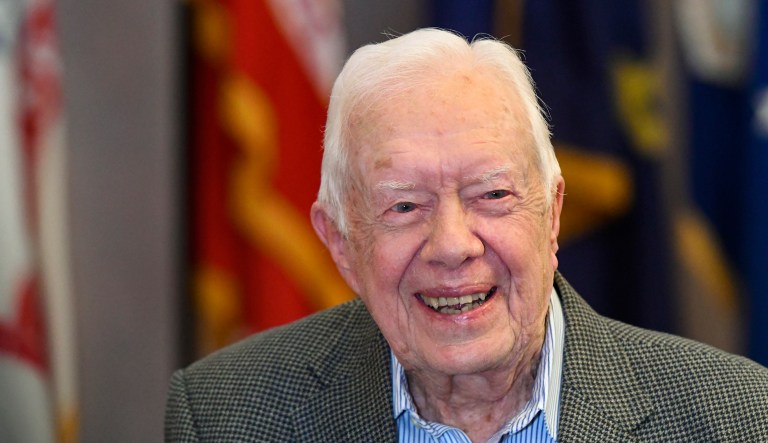 In this April 11, 2018 file photo, former President Jimmy Carter, 93, sits for an interview before a book signing in Atlanta.