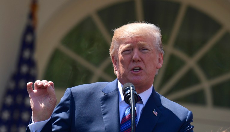 President Trump speaks during an event in the Rose Garden.