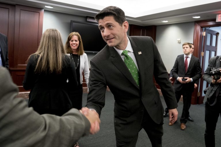 House Speaker Paul Ryan of Wis., shakes hands following a roundtable with American taxpayers on tax reform on Capitol Hill, Tuesday, April 17, 2018, in Washington.