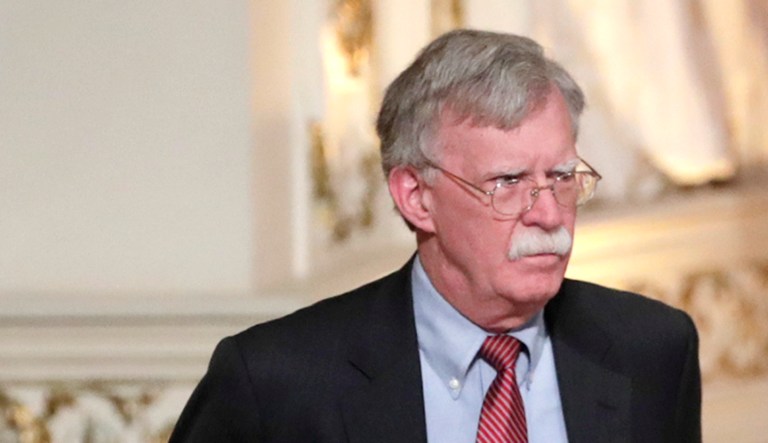 National security adviser John Bolton arrives for a news conference in Palm Beach, Fla.