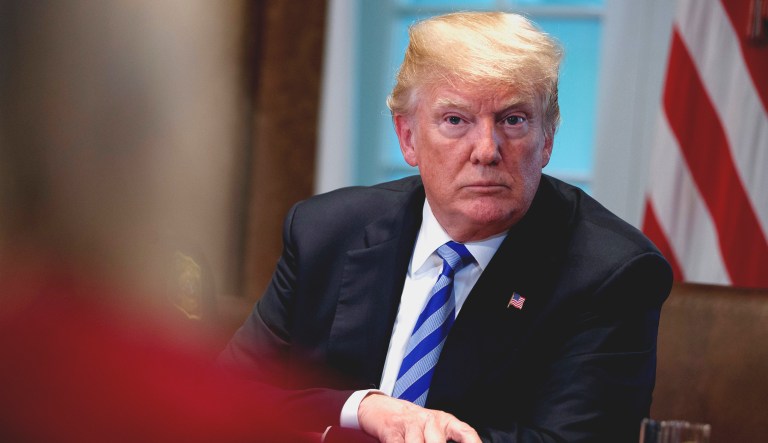President Trump listens during a meeting in the Cabinet Room of the White House in Washington, D.C.