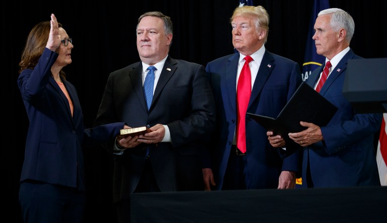 Incoming Central Intelligence Agency director Gina Haspel is sworn in by Vice President Mike Pence during a ceremony at CIA Headquarters, Monday, May 21, 2018, in Langley, Va. From left, Haspel, Secretary of State Mike Pompeo, President Donald Trump, and Pence.