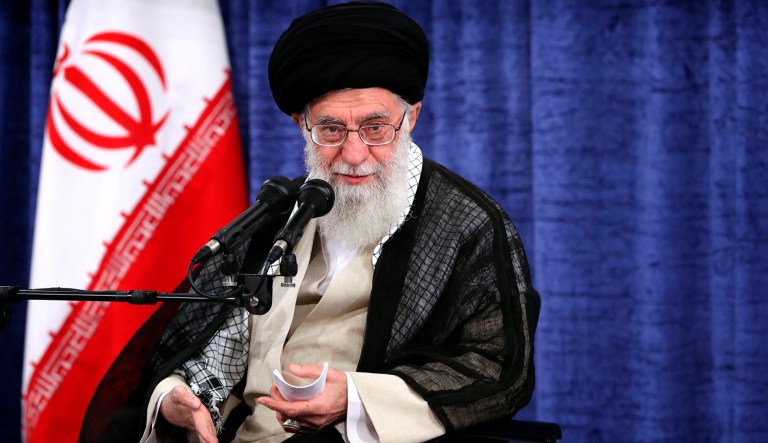 In this picture released by the official website of the office of the Iranian supreme leader, Supreme Leader Ayatollah Ali Khamenei speaks during a meeting with government officials in Tehran, Iran, Wednesday, May 23, 2018. Iran's supreme leader is criticizing the U.S. over its hard-line stance toward the country since President Donald Trump's decision to withdraw from a landmark nuclear deal with Western powers. 
