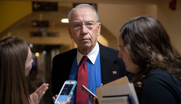 Senate Judiciary Committee Chairman Chuck Grassley, R-Iowa, pauses for a reporter as he leaves the Capitol.