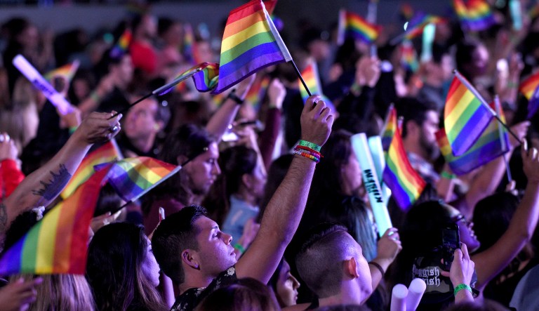 Fans waive rainbow flags in honor of LGBT Pride month at Wango Tango at Banc of California Stadium on Saturday, June 2, 2018, in Los Angeles.