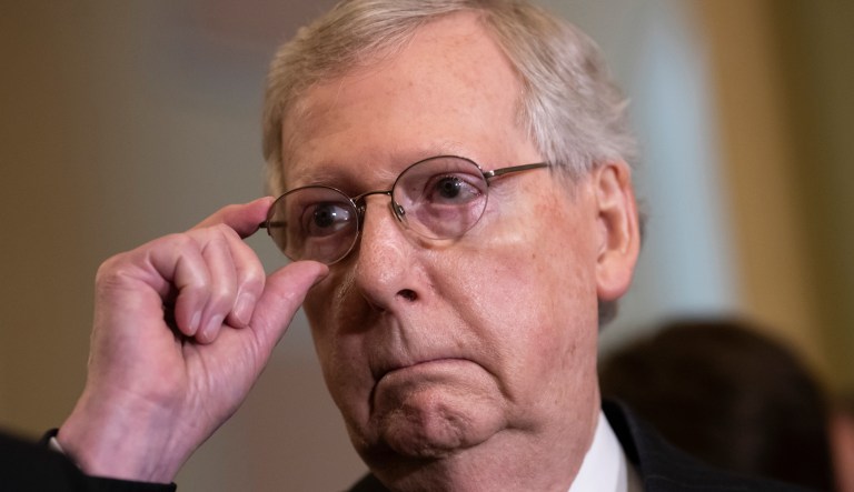 Senate Majority Leader Mitch McConnell, R-Ky., tells reporters he intends to cancel the traditional August recess and keep the Senate in session to deal with backlogged tasks, on Capitol Hill in Washington, Tuesday, June 5, 2018.