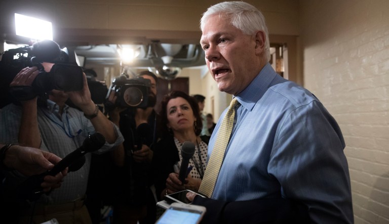 House Rules Committee Chairman Pete Sessions, R-Texas, answers questions from reporters as House Republicans try to bridge their party's internal struggle over immigration at a closed-door meeting on Capitol Hill in Washington, Thursday, June 7, 2018. Top Republicans want to head off an election-year showdown that divides the party.