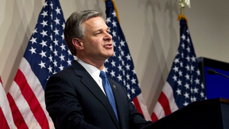 FBI Director Christopher Wray speaks during a news conference on the inspector general's report at FBI headquarters on Thursday, June 14, 2018, in Washington.