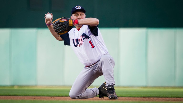 Rep. Steve Scalise, R-La., makes a play to first base, resulting in an out, on the first pitch of the 57th Congressional Baseball Game at National's Park in Washington, Thursday, June 14, 2018. On June 14, 2017, Scalise and some other Congressional members were victims of a shooting at the baseball field they were practicing on in Alexandria, Va.