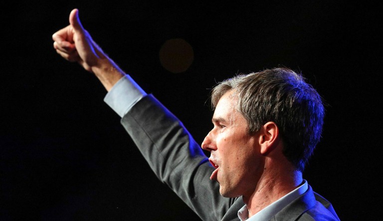 Beto O'Rourke gives a thumbs up to the crowd after speaking.