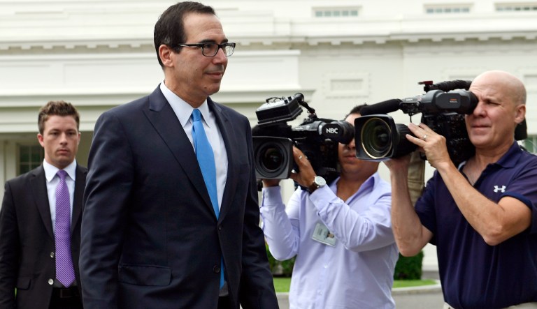 Treasury Secretary Steven Mnuchin walks out to speak with reporters at the White House in Washington, Wednesday, June 27, 2018.