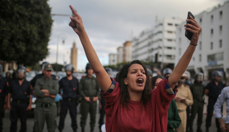 A protester chants slogans during a march denouncing heavy sentences against Hirak activists, in Rabat, Morocco, on June 27, 2018.