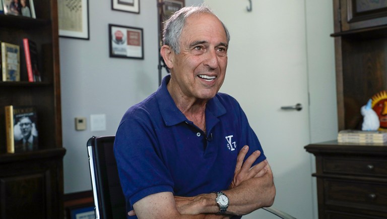 Attorney Lanny Davis speaks during an interview with The Associated Press in his K Street office in Washington.