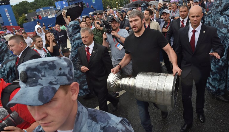 Washington Capitals Alex Ovechkin, from Russia, holds the Stanley Cup trophy at the fan zone in Moscow ahead of the the quarterfinal match between Russia and Croatia at the 2018 soccer World Cup that is being played in the Fisht Stadium, in Sochi, Russia, Saturday, July 7, 2018. Ovechkin is bringing the Stanley Cup to the World Cup. Fresh off winning the NHL title, the Washington Capitals forward is taking the trophy to Moscow on Saturday, where it will be exhibited at a "fan fest" public viewing site ahead of Russia's quarterfinal game against Croatia.