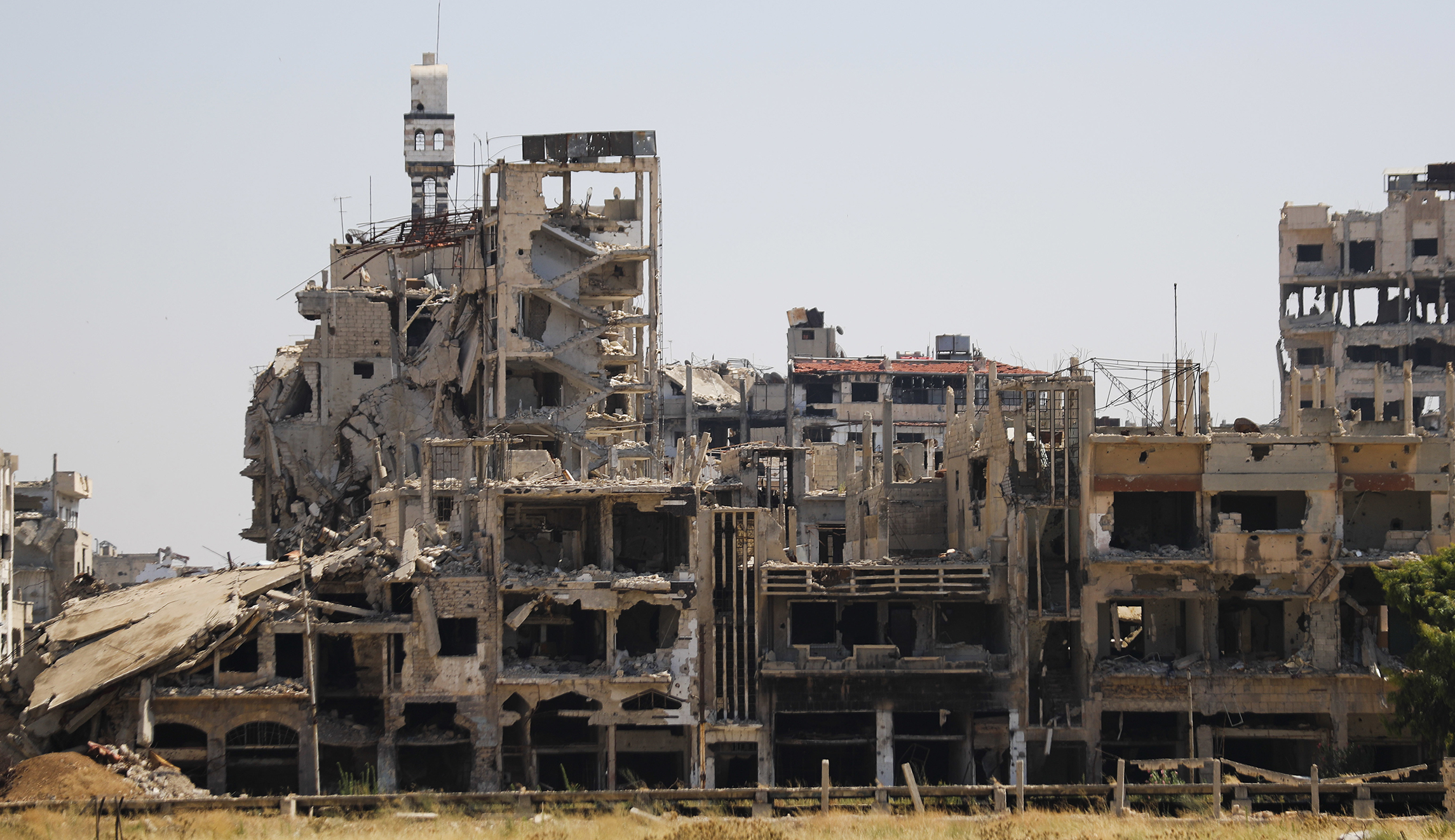 Rebels evacuate southwest Syria as government gains ground, continues offensive