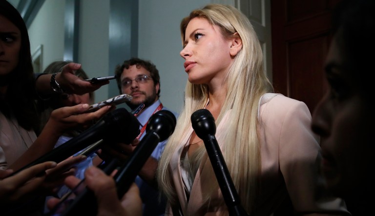 Simona Mangiante Papadopoulos, wife of former Trump campaign adviser George Papadopoulos, speaks to the media after attending a closed-door meeting with Democrats on the House Intelligence Committee on July 18, 2018.