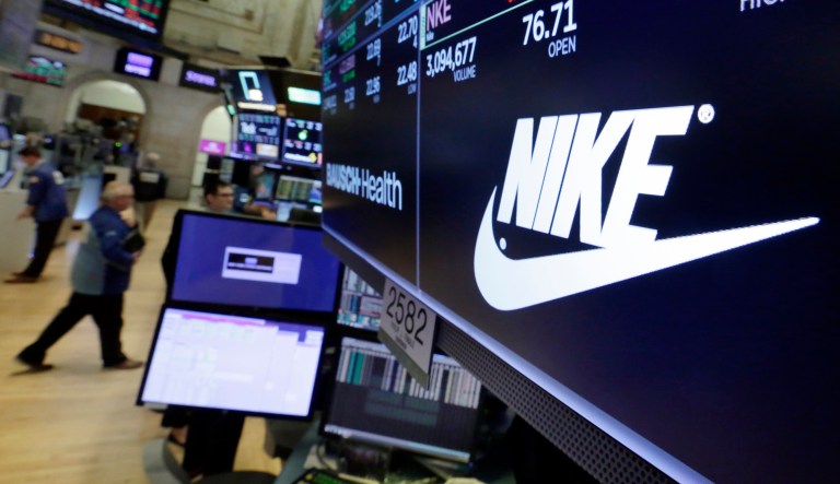 The logo for Nike is displayed above a trading post on the floor of the New York Stock Exchange, Monday, July 23, 2018. 