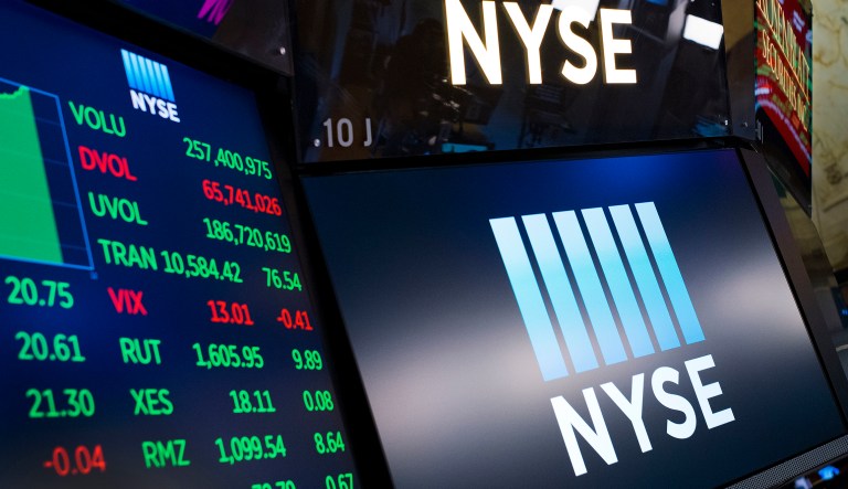 In this May 10, 2018, file photo, stock screens are shown at the New York Stock Exchange.