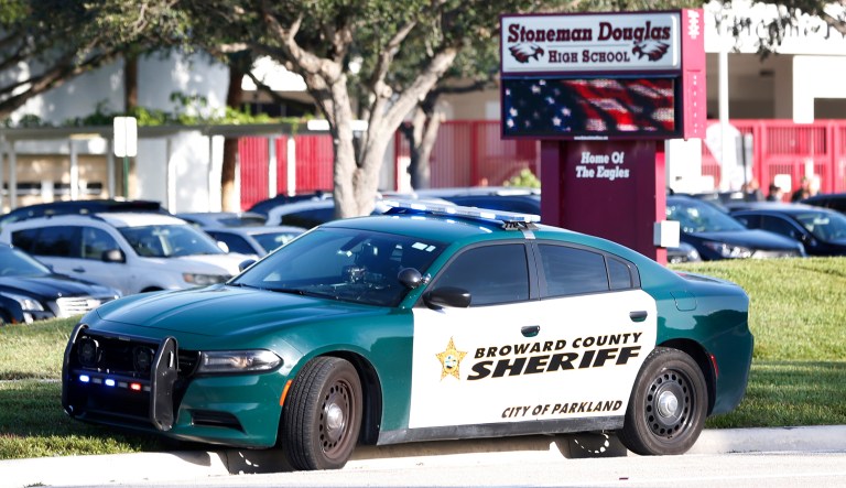 A Broward County Sheriff's Office vehicle is parked outside Marjory Stoneman Douglas High School, Wednesday, Aug. 15, 2018, in Parkland, Fla.