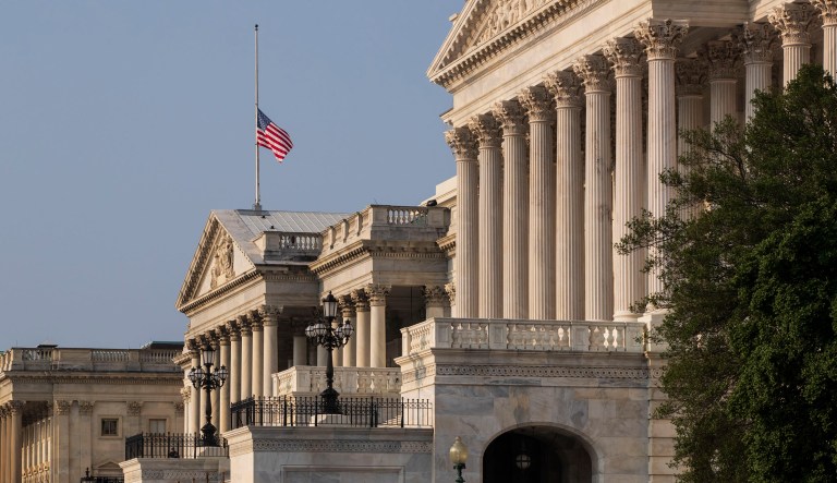 The American flag flies at half-staff at the Capitol in honor of Sen. John McCain of Arizona who died Saturday of brain cancer, in Washington, Monday, Aug. 27, 2018. McCain will lie in state in the Capitol Rotunda on Friday.