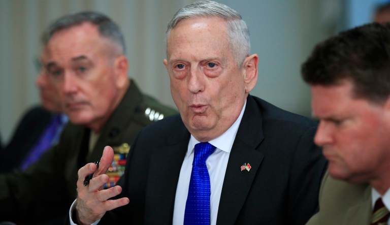 Secretary of Defense Jim Mattis, center, with Chairman of the Joint Chiefs of Staff, Marine Gen. Joseph Dunford, left, answers questions from the media during a meeting with Indonesia's Defense Minister Indonesia Ryamizard Ryacudu, during their meeting at the Pentagon, Tuesday, Aug. 28, 2018.